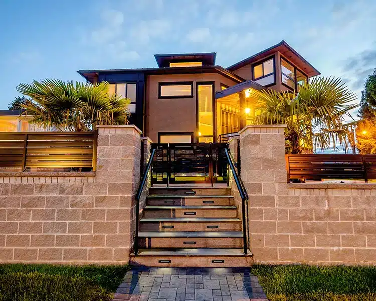 Photo of Black Deck Step Linear Light Low Voltage on steps leading up to a contemporary home