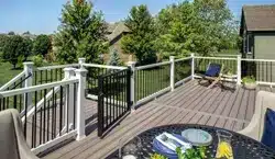 PHoto of deck with railing and gate