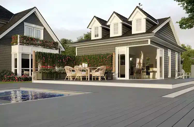 trn-lineage-cape-cod-002-im-angle-house-pool-dining_Article-Image-Main (1) copia Photo of deck with Trex Lineage deck boards
