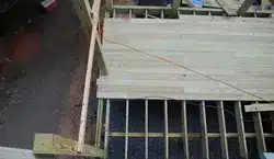 photo of a wood deck being built
