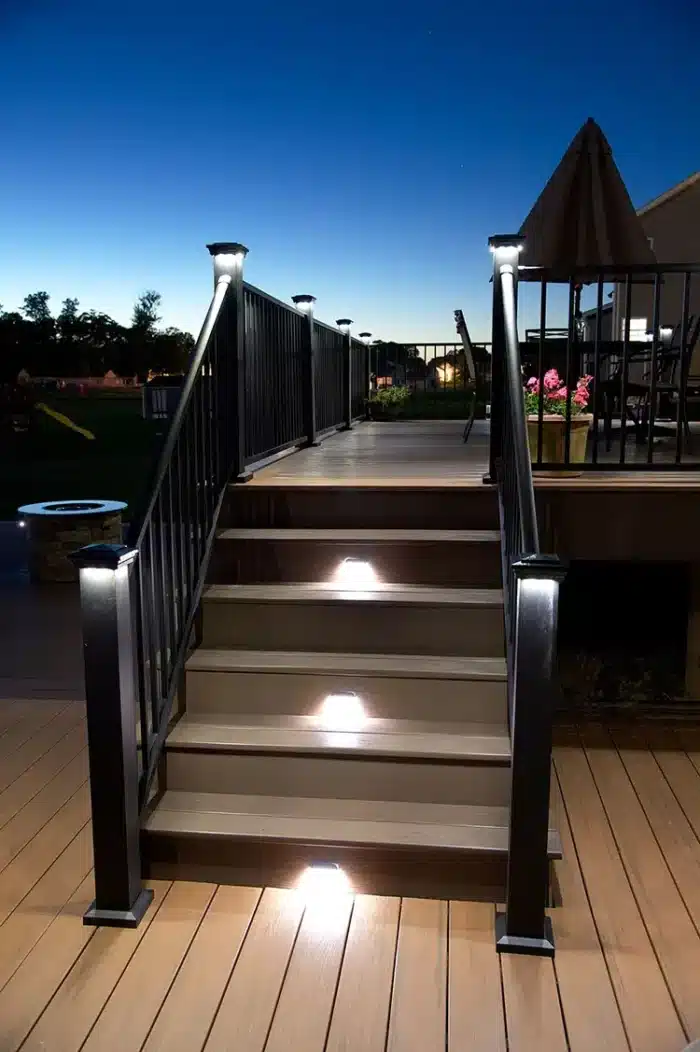 Photo of recessed lights in deck steps and post cap lights